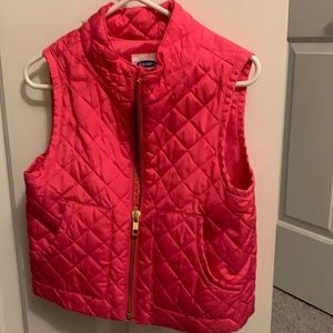 Pink quilted vest.